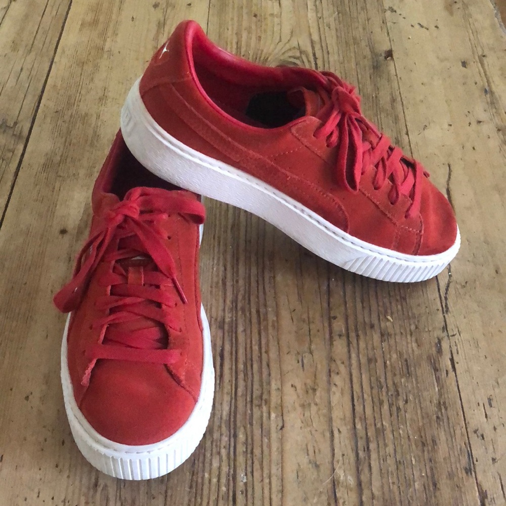 Red suede puma sneakers